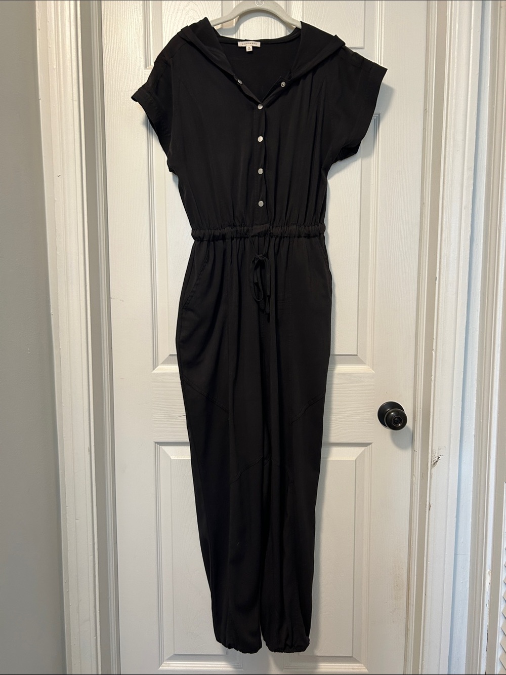 Black Hooded Button-Front Jumpsuit with Drawstring Waist